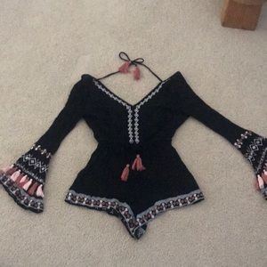 Black bell sleeve romper with tassels